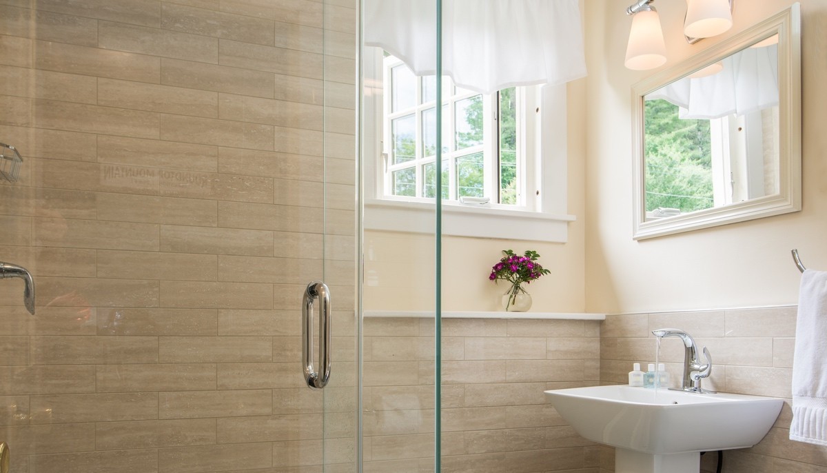 glass shower and window with natural light