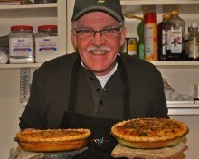 george holding homemade quiche