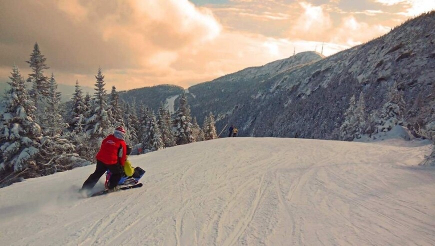 skiing down snowy vermont mountain